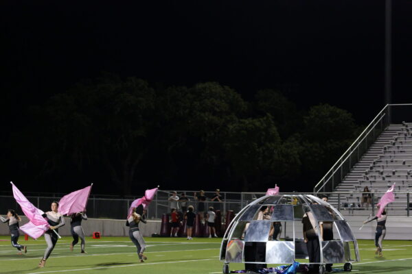 Moe and Gene Johnson HS | Flags performing around prop