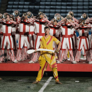 Color Guard member in front of hornline | Bluecoats 2024