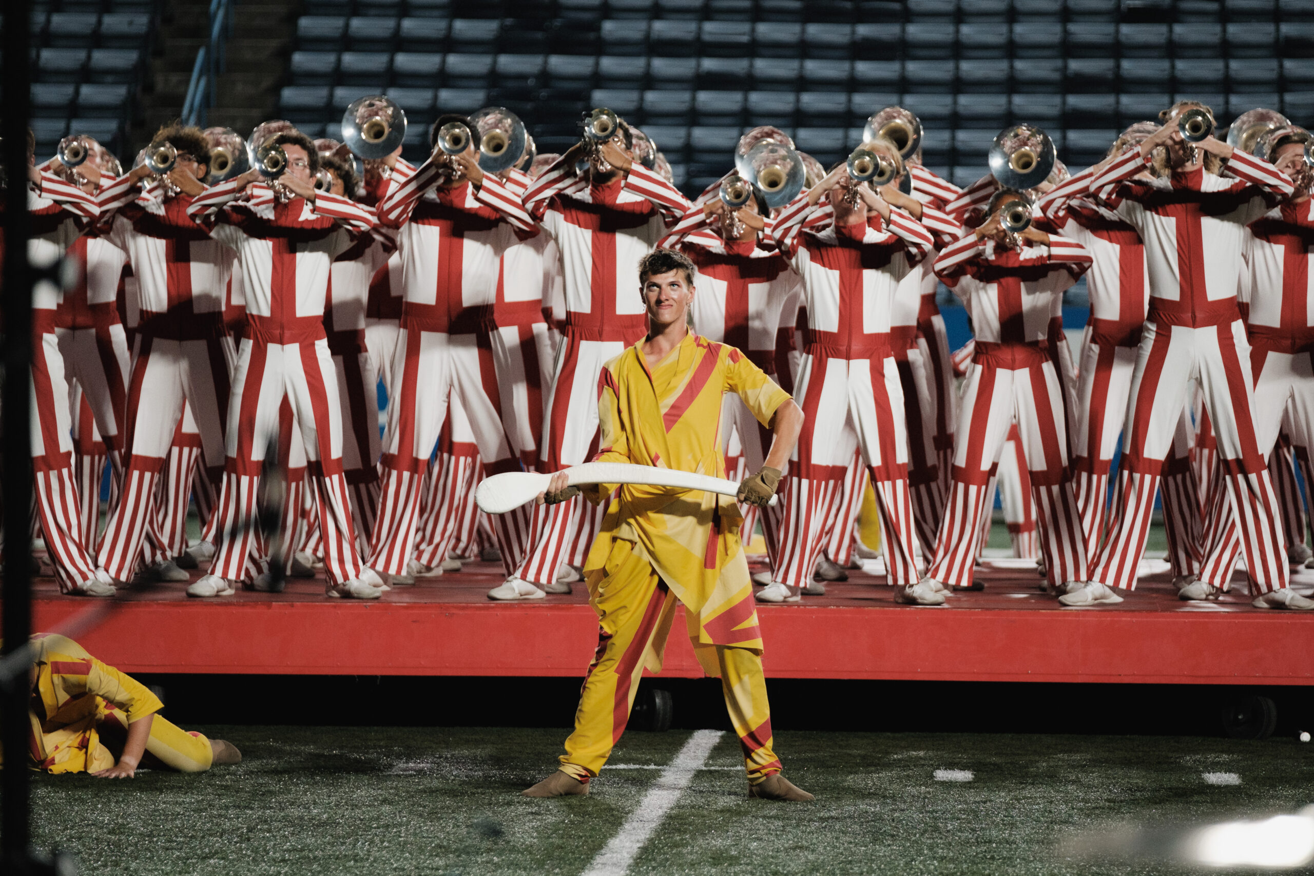 Color Guard member in front of hornline | Bluecoats 2024