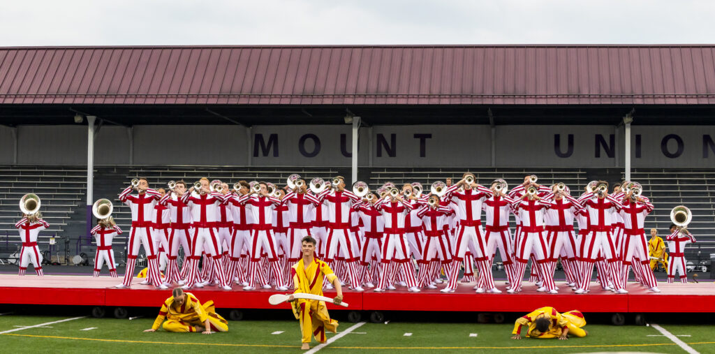 Wide shot of hornline on prop | 2024 Bluecoats