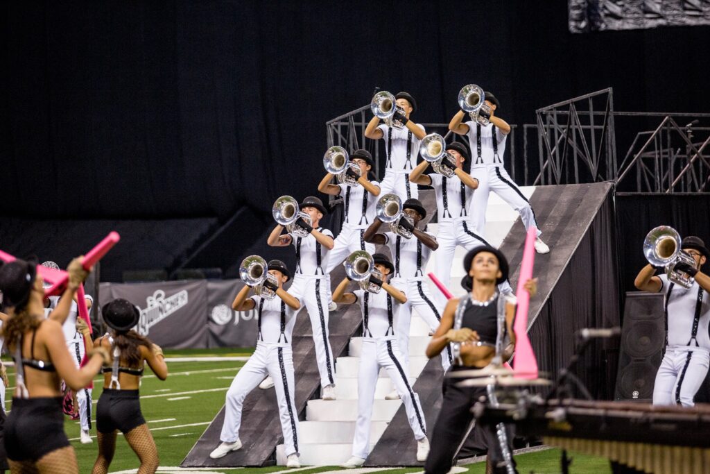 Hornline performing on the stairs | 2017 Bluecoats